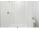 Freshly tiled bathroom with a glass shower door, and modern fixtures at 4701 Jasmine Cir, Leesburg, FL 34748