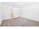 The bedroom features neutral walls, carpet, and an entrance to another room at 4701 Jasmine Cir, Leesburg, FL 34748