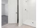 Bathroom features a modern walk-in shower with white tile at 4705 Jasmine Cir, Leesburg, FL 34748