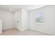 An entryway with tile flooring, a window, and a white entry door at 4705 Jasmine Cir, Leesburg, FL 34748