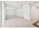 Bright, open-concept living room with tile flooring and neutral paint at 4705 Jasmine Cir, Leesburg, FL 34748