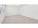 Bright, open-concept living room with tile flooring and neutral paint at 4705 Jasmine Cir, Leesburg, FL 34748