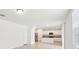 Open living space with eat-in kitchen featuring stainless appliances at 4705 Jasmine Cir, Leesburg, FL 34748