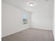 This is a clean bedroom with light colored walls and a window at 4721 Jasmine Cir, Leesburg, FL 34748