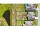 Spacious lot featuring pond, fenced yard, and proximity to a pool, offering privacy and outdoor possibilities at 521 Sanctuary Blvd, Winter Haven, FL 33881
