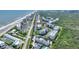 Panoramic aerial shot showcases oceanfront condos, mature landscaping, close beach access and proximity to amenities at 5300 S Atlantic Ave # 2-505, New Smyrna Beach, FL 32169