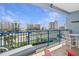 Balcony boasts city and ocean views from cozy seating area overlooking lush landscaping and distant beaches at 5300 S Atlantic Ave # 2-505, New Smyrna Beach, FL 32169