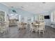 The resident clubhouse has lots of natural light, tables and chairs, and a serving bar at 5300 S Atlantic Ave # 2-505, New Smyrna Beach, FL 32169
