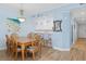 Elegant dining area with unique chairs, a table for six, and decor at 5300 S Atlantic Ave # 2-505, New Smyrna Beach, FL 32169