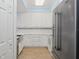 Charming kitchen featuring stainless appliances, white cabinets, and modern sink at 5300 S Atlantic Ave # 2-505, New Smyrna Beach, FL 32169