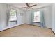 Bright bedroom featuring carpet floors, a ceiling fan, and white walls at 5330 Keswick Ct, Orlando, FL 32812