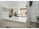 Beautiful kitchen with white cabinets, island with countertop, and modern finishes at 5330 Keswick Ct, Orlando, FL 32812
