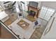 Aerial view showcasing the open living space, fireplace, and tile flooring extending to the dining area at 5330 Keswick Ct, Orlando, FL 32812
