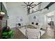 Open living room with a high ceiling, upper level, and stylish decor for a welcoming atmosphere at 5330 Keswick Ct, Orlando, FL 32812