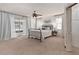 Serene main bedroom featuring ample natural light, neutral tones, and ceiling fan at 5330 Keswick Ct, Orlando, FL 32812