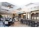 Amenity center features contemporary lighting, lounge seating, and a bar area at 5416 Solterra Cir, Davenport, FL 33837