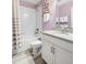The bathroom includes a shower-tub combo, sleek vanity, and modern fixtures at 5416 Solterra Cir, Davenport, FL 33837