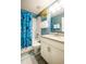 Charming bathroom with a tub, shower, granite vanity, and cabinets at 5416 Solterra Cir, Davenport, FL 33837