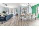 Spacious open-plan living and dining area featuring modern decor and abundant natural light at 5416 Solterra Cir, Davenport, FL 33837