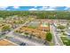 Aerial shot displays the community layout with parking, pool, and tennis court access at 5763 Saint Christopher Dr # 55, Orlando, FL 32822