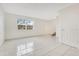 Bright, open-concept living area with neutral tile and access to the second floor at 5763 Saint Christopher Dr # 55, Orlando, FL 32822