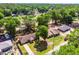 Overhead view of multiple homes with tree-filled landscapes in the area at 5831 Nw 58Th Ter, Ocala, FL 34482