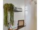 Bright bathroom featuring floating shelves with decorative towels and hanging greenery at 5831 Nw 58Th Ter, Ocala, FL 34482