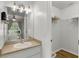 Bathroom vanity and large mirror, next to the walk-in closet at 5831 Nw 58Th Ter, Ocala, FL 34482