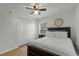 Bedroom with a large window and double closet at 5831 Nw 58Th Ter, Ocala, FL 34482