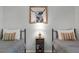 Charming bedroom showcasing twin beds and a rustic accent table at 5831 Nw 58Th Ter, Ocala, FL 34482