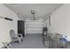 Spacious garage with ample room for storage and a grill at 5831 Nw 58Th Ter, Ocala, FL 34482