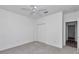 Bedroom with carpet, fan, and double door closet at 7563 Sw 78Th Ter, Ocala, FL 34481