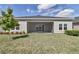 Exterior view of a screened-in patio, perfect for enjoying the outdoors while staying protected from insects at 7563 Sw 78Th Ter, Ocala, FL 34481