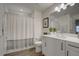 Cozy bathroom with modern vanity, and a bathtub shower, providing comfort and functionality at 7651 Whisper Way # 104, Reunion, FL 34747