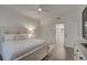 Bright bedroom featuring a comfortable bed, and neutral decor, offering a peaceful retreat within the home at 7651 Whisper Way # 104, Reunion, FL 34747