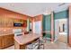Charming kitchen with an island, appliances, and lots of counter space at 7718 Cafaro Dr, Orlando, FL 32818