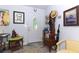 Cozy entryway featuring unique decor, artwork, and a welcoming atmosphere at 7761 Hillcrest Ter, Orlando, FL 32810