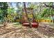 Charming A-frame house with a deck nestled among lush trees at 7807 Napoleon St, Orlando, FL 32825