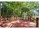 Spacious deck with wood railings provides a perfect place for outdoor gatherings at 7807 Napoleon St, Orlando, FL 32825