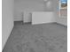 Bonus room featuring carpeted floors and lots of natural light at 9153 Harris Hawk Dr, Leesburg, FL 34788