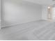 Spacious bedroom features plush carpeting, neutral paint, and modern design at 9568 Starling Loop, Leesburg, FL 34788