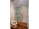 This bathroom features modern subway tile, a glass shower, and updated fixtures at 10 N Summerlin Ave # 25, Orlando, FL 32801