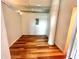 Bedroom features hardwood floors, bright white walls and ceilings, with modern exposed ductwork at 10 N Summerlin Ave # 25, Orlando, FL 32801