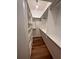Walk-in closet featuring built-in shelving and hardwood floors, creating an organized storage space at 10 N Summerlin Ave # 25, Orlando, FL 32801
