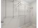 Spacious walk-in closet with adjustable wire shelving to maximize organization and storage space at 11005 Cypress Leaf Dr, Orlando, FL 32825