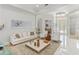 Spacious living room featuring neutral tones, tile flooring, and an open layout at 11139 Camden Park Dr, Windermere, FL 34786