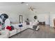 The spacious main bedroom features hardwood floors, neutral decor, and ample office and sitting space at 11139 Camden Park Dr, Windermere, FL 34786