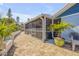 Screened in lanai with a beautiful view of the garden at 120 Sand Dunes Dr, Ormond Beach, FL 32176