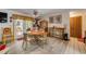 Cozy dining area with access to outdoor patio and counter seating at 120 Sand Dunes Dr, Ormond Beach, FL 32176