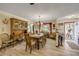 Dining room with wooden table and chairs, complemented by natural light at 120 Sand Dunes Dr, Ormond Beach, FL 32176